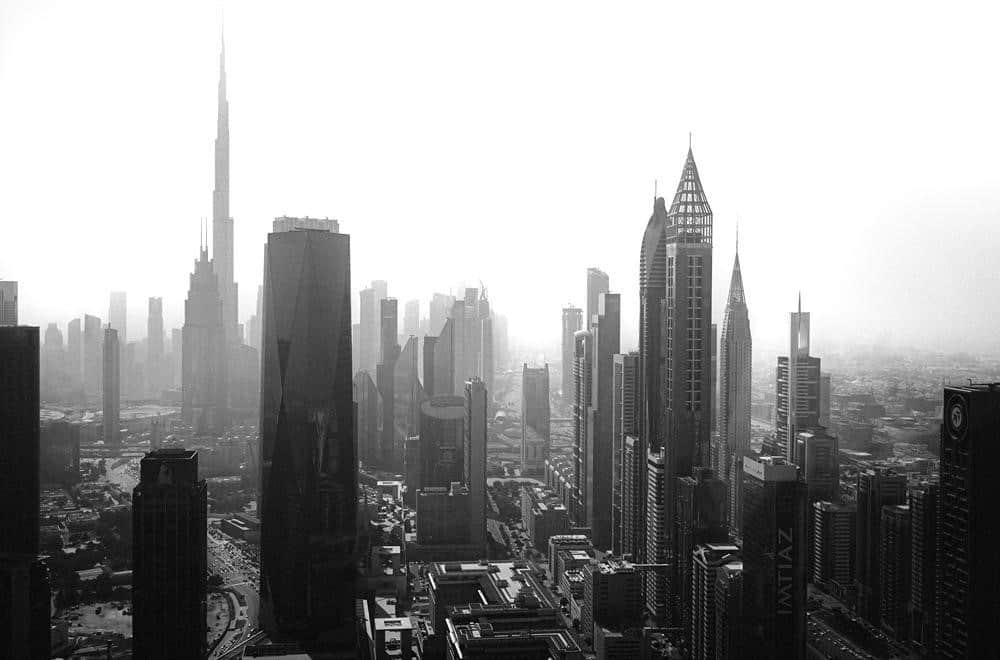 How do REITs work in the UAE property market?