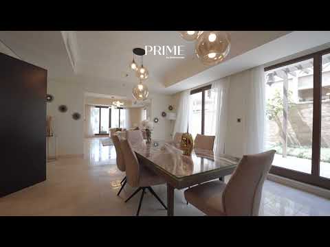 This impeccably furnished 6 - bedroom Balqis Residence villa is for sale on Palm Jumeirah.