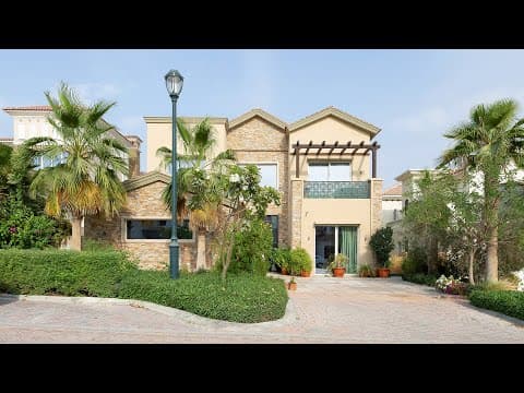 Luxurious lush landscaped 5 bedroom Wildflower villa for sale in Jumeirah Golf Estates.